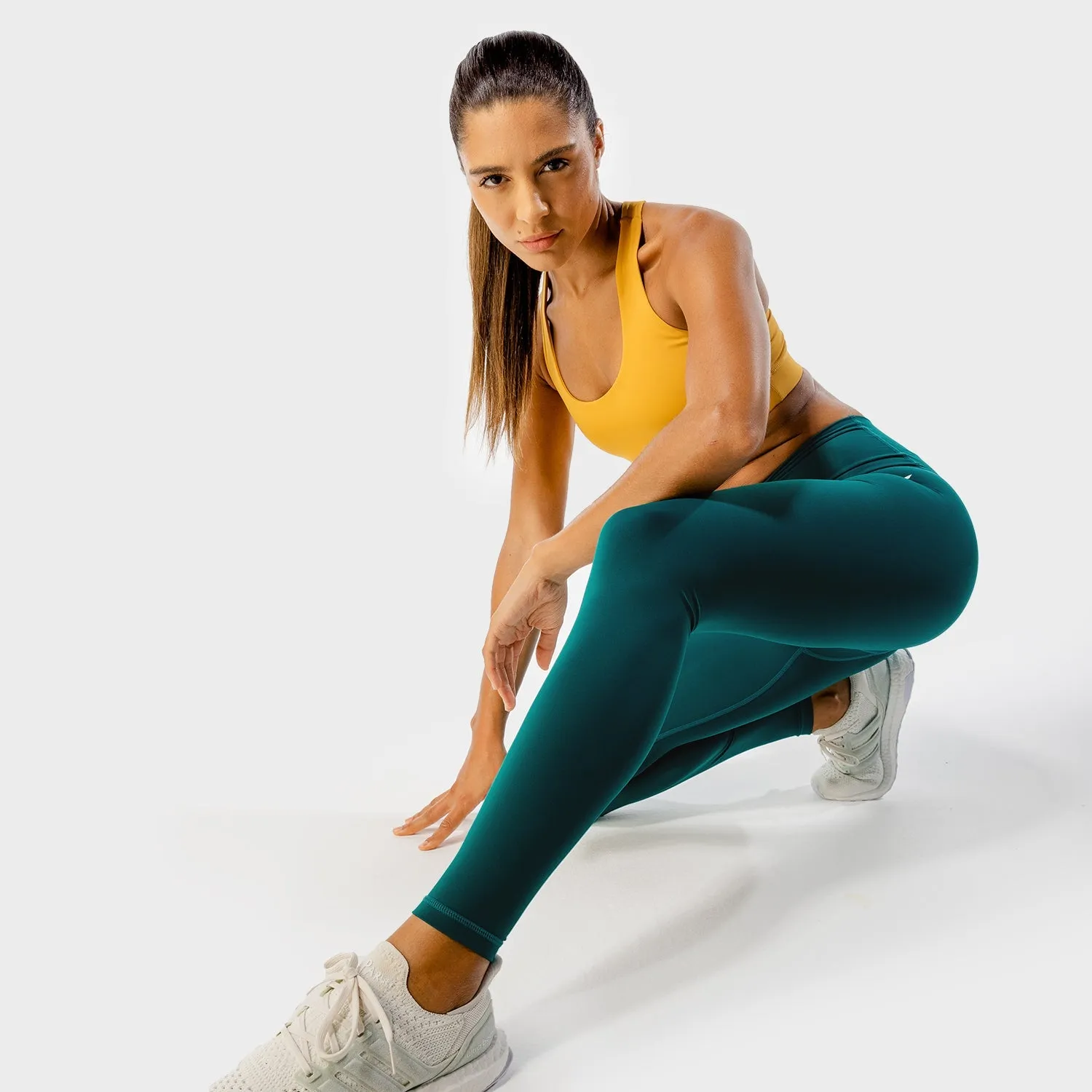 Sure! Here is an optimized product title with modifiers:

Womens High-Performance Core Agile Leggings - Teal Activewear