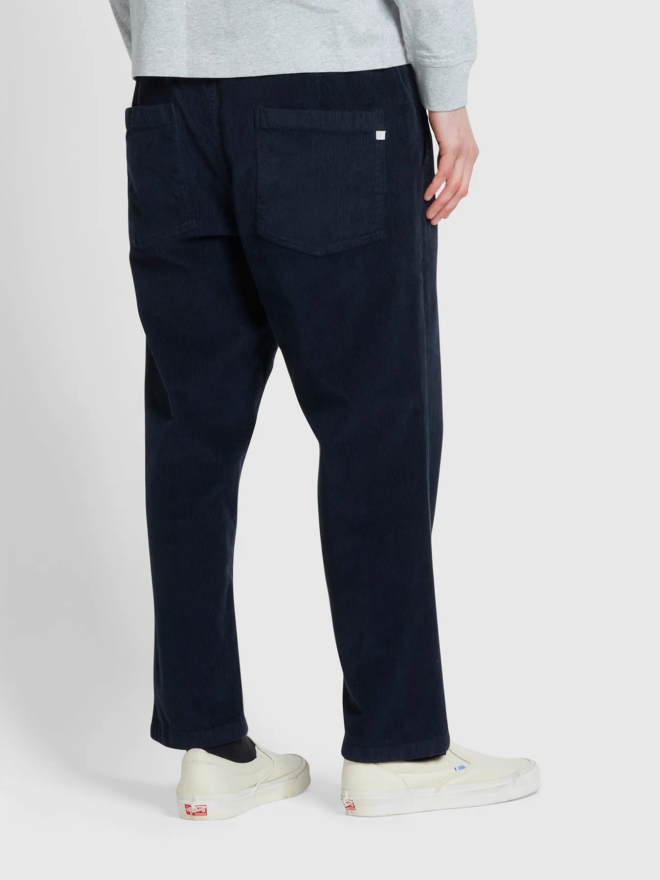 Hawtin Relaxed Tapered Fit Cord Trousers In True Navy